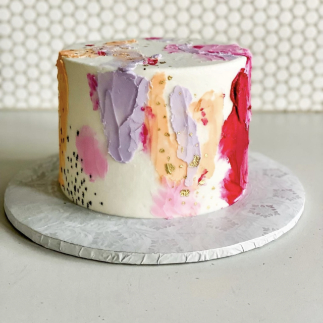 pallete marks with purple, pink, orange gold splatter cake