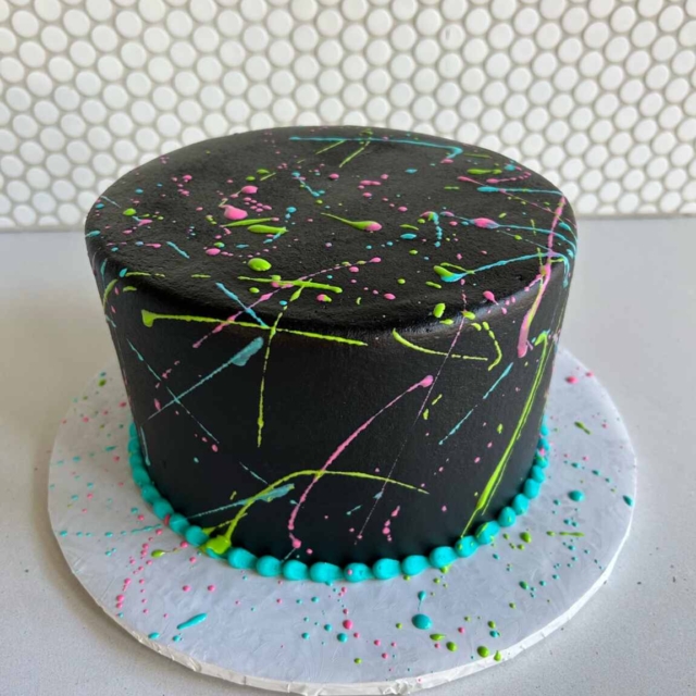 Smooth splatter neon colors black cake