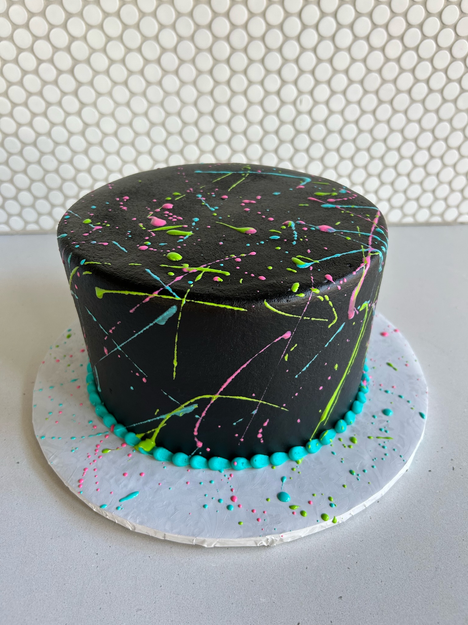 Smooth splatter neon colors black cake