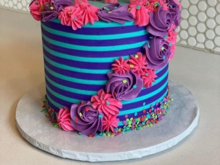blue purple with star and flowers cascade cake