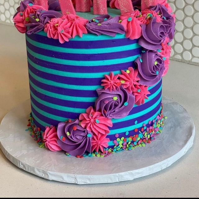 blue purple with star and flowers cascade cake