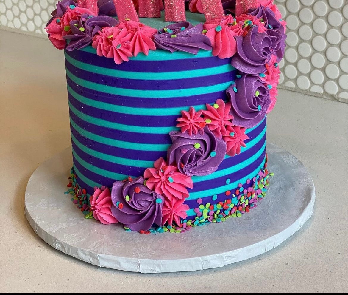blue purple with star and flowers cascade cake
