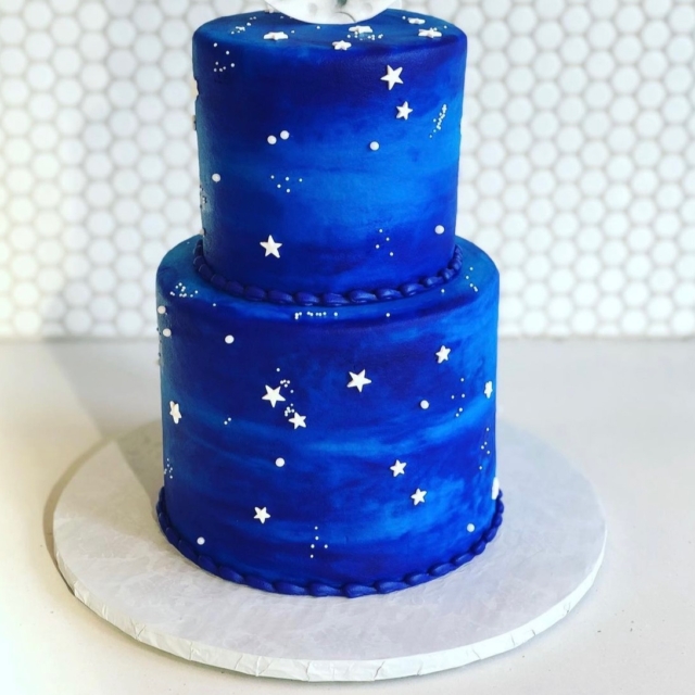 Blue stars two tier galaxy cake