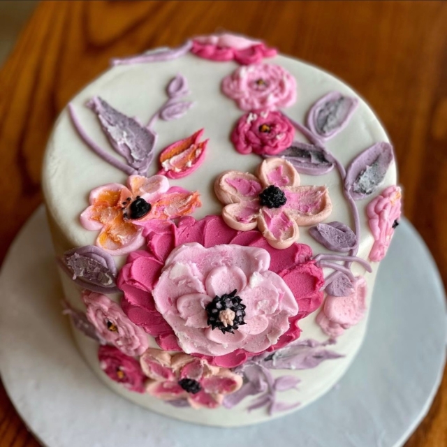 pink and purple cake with leaf details