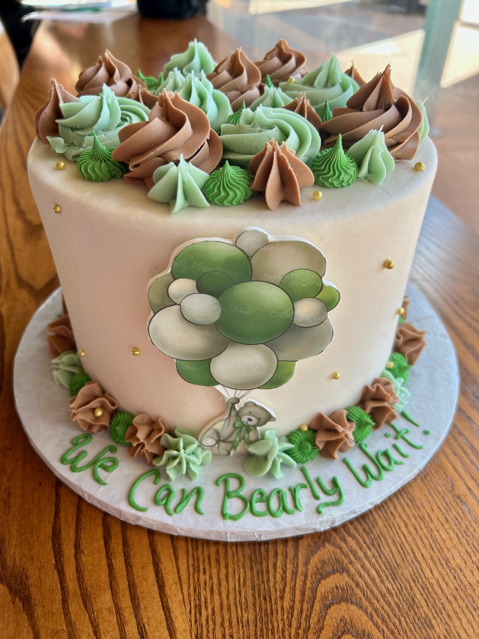bear cake with green and brown dollops