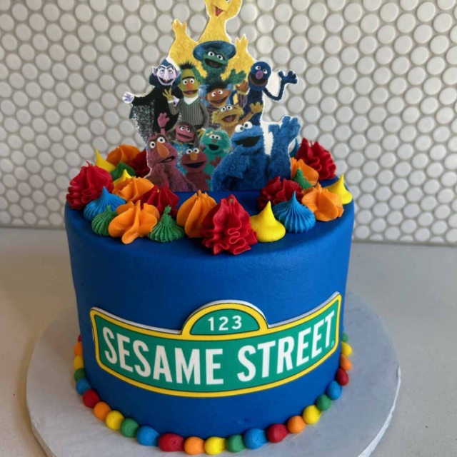 blue sesame street characters cake