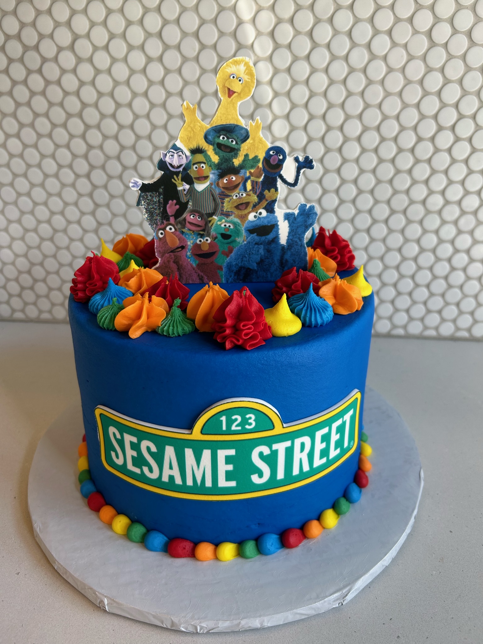 blue sesame street characters cake