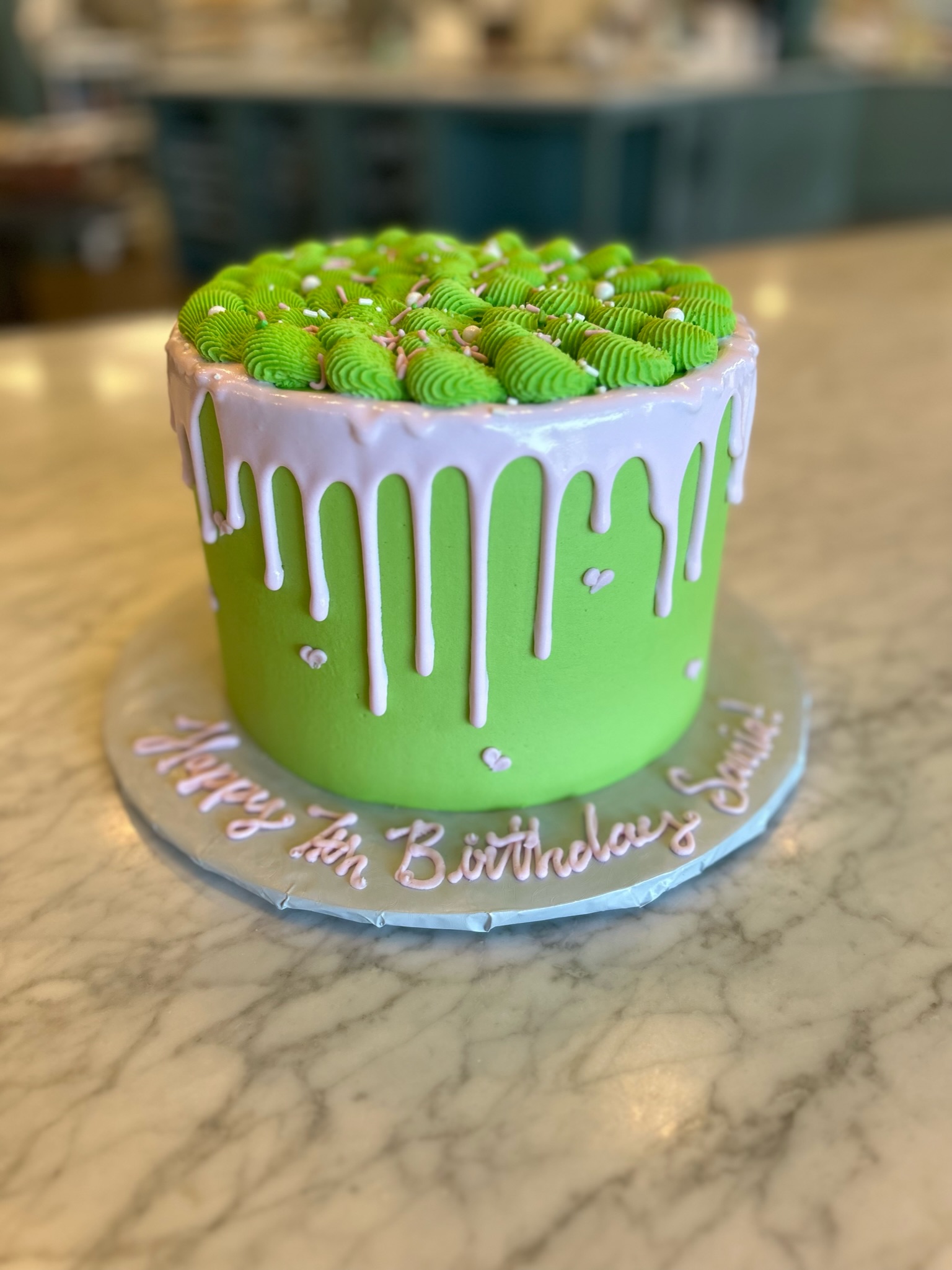 bright green drip cake