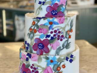 Violet blue green wild flowers cascading cake