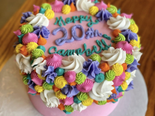 pink purple green white  yellow tips cake