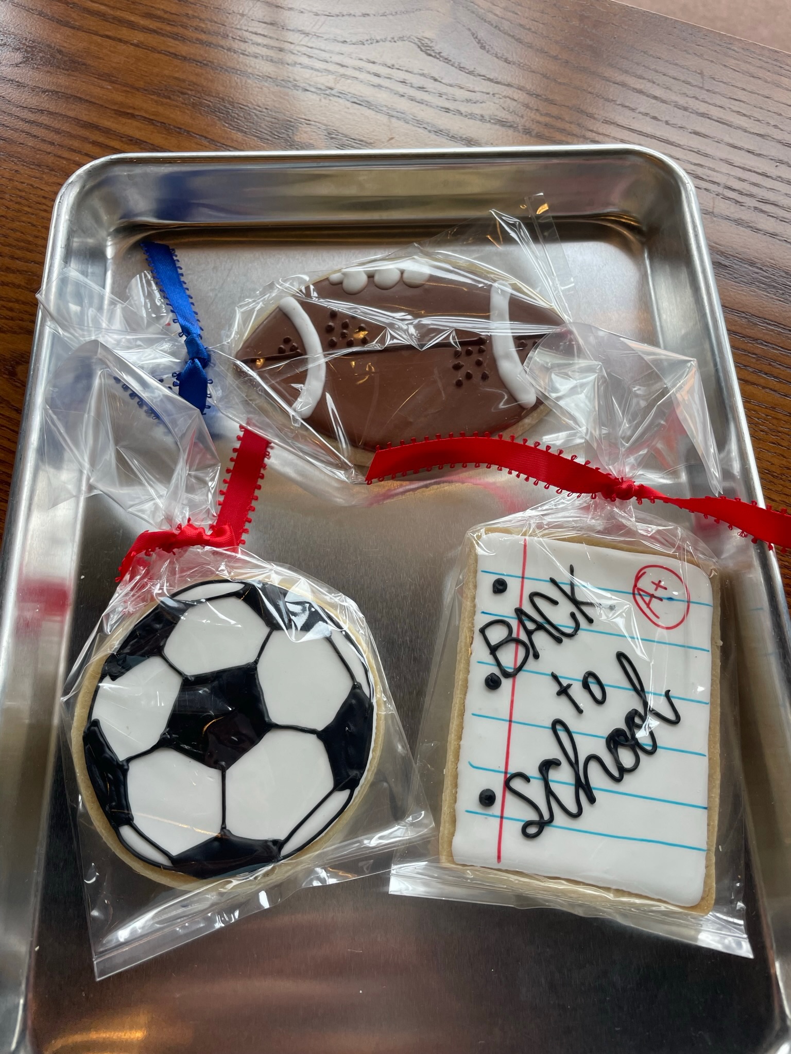 sugar cookies in shape of sports balls football soccer ball