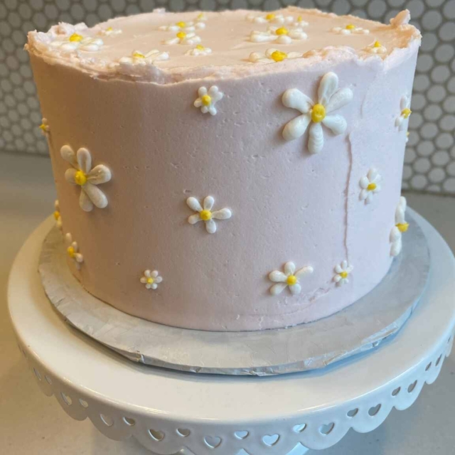 light pink daisy cake rough edge