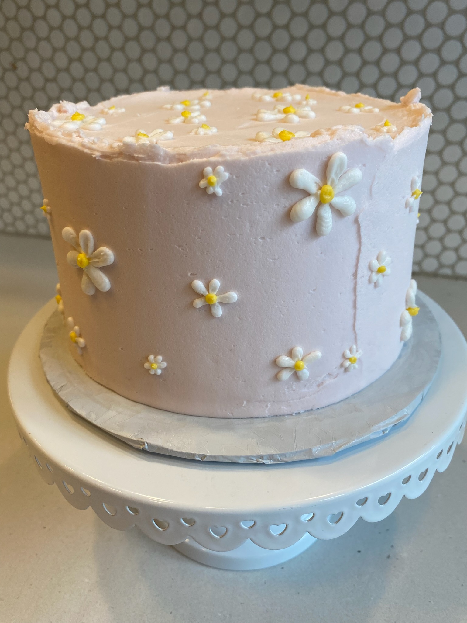 light pink daisy cake rough edge